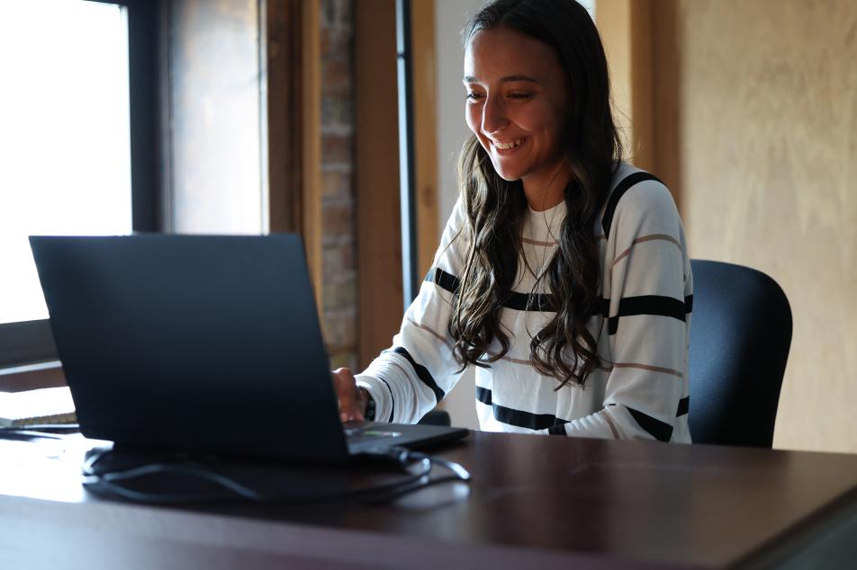 Grace working on laptop