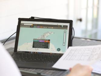 Keweenaw time traveler map on laptop