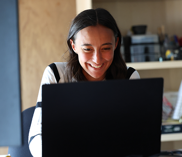 Grace working on laptop